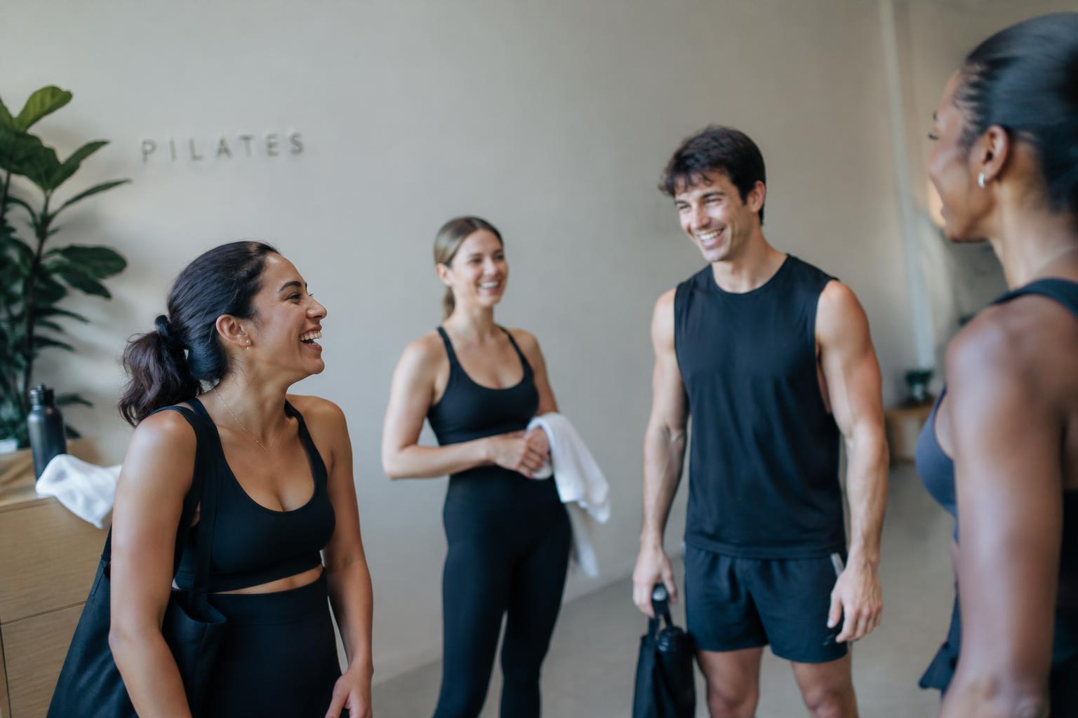 Members laughing together after class