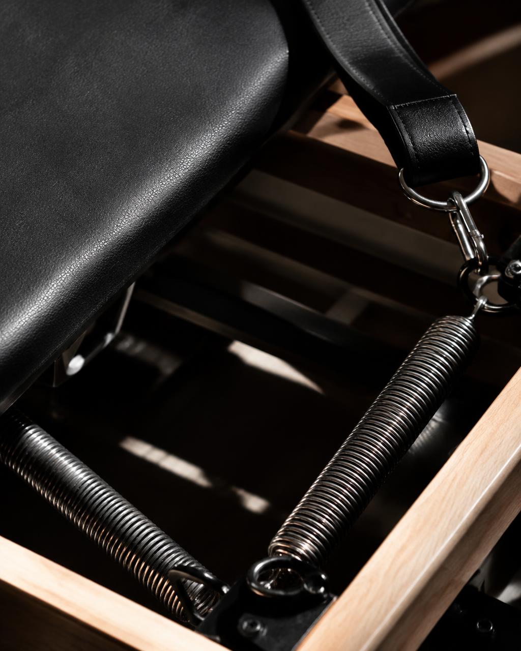 Reformer springs and leather strap detail